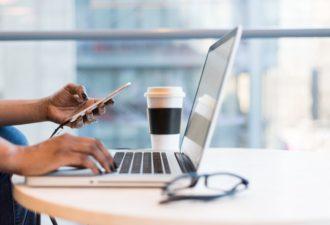 healthcare content woman on phone and computer